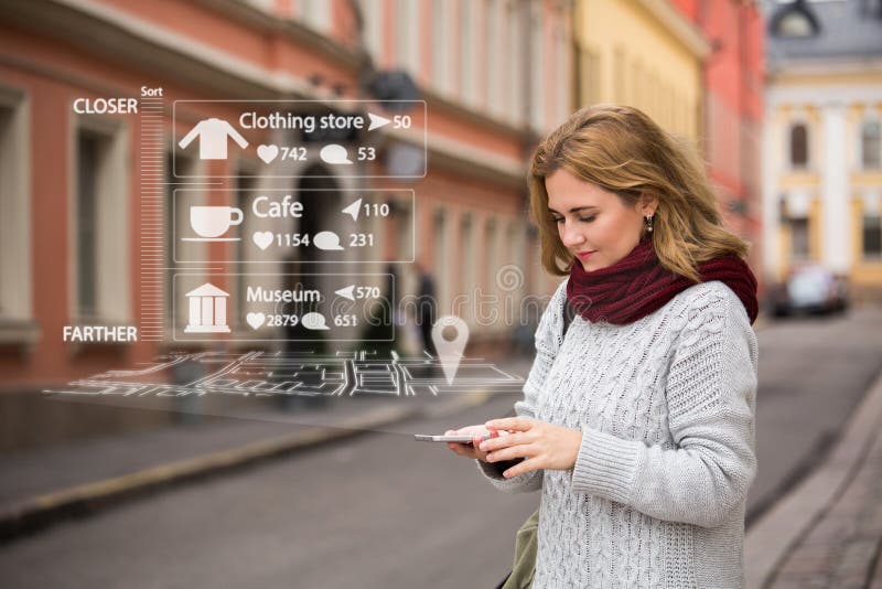Augmented reality in marketing. Woman traveler with phone. royalty free stock photography Augmented reality in marketing. Woman traveler with phone. royalty free stock photography