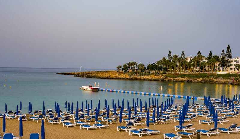 August 2, 2017.Protaras.Chairs with umbrellas on the beach in Fig tree Bay in Protaras .Cyprus.