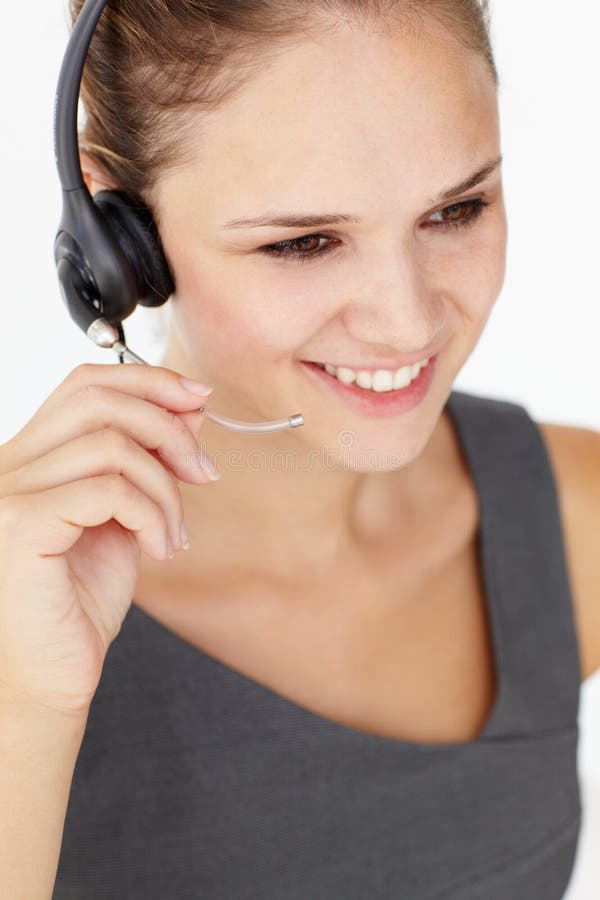 Auriculares desgastando da mulher de negócios nova fotos de stock Auriculares desgastando da mulher de negócios nova fotos de stock