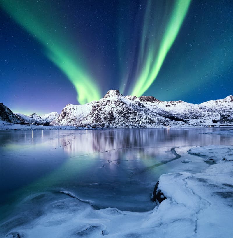 Aurora Borealis, Lofoten islands, Norway. Nothen light, mountains and frozen ocean. Winter landscape at the night time. stock photos Aurora Borealis, Lofoten islands, Norway. Nothen light, mountains and frozen ocean. Winter landscape at the night time. stock photos