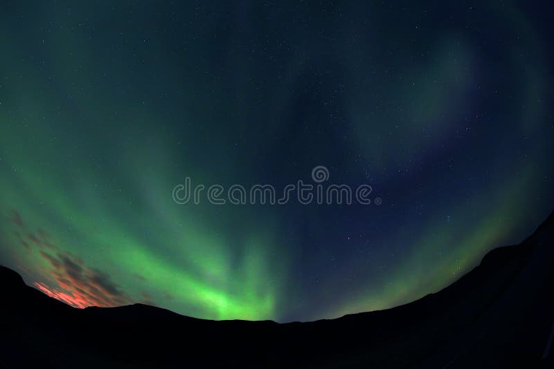 Aurora Borealis Against The Sunset Sky In Iceland Stock Photo Image Of Night Bright