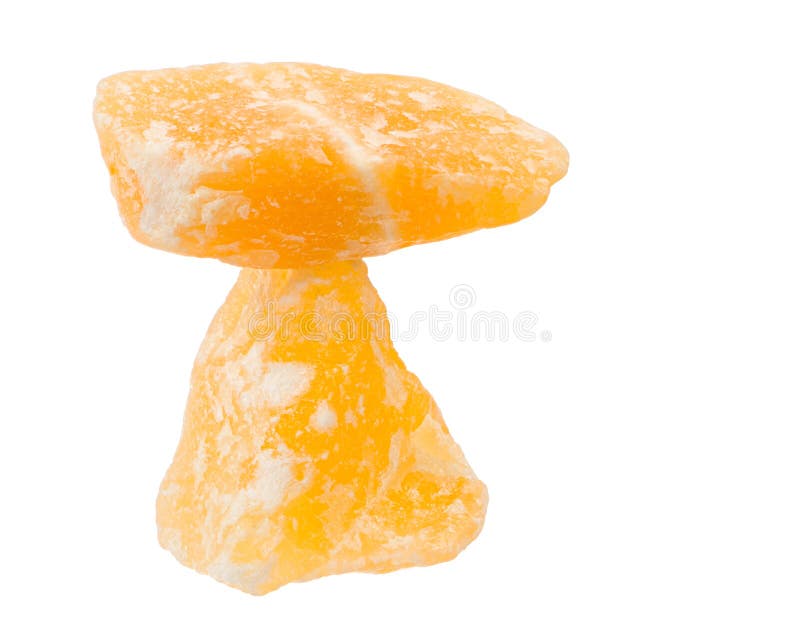 Isolted balanced orange calcite healing stones. Isolted balanced orange calcite healing stones