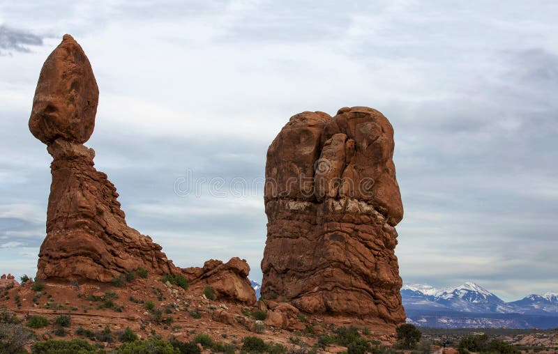 Balanced Rock and the La Sal mountains in the background of Arches National Park in Moab Utah. Balanced Rock and the La Sal mountains in the background of Arches National Park in Moab Utah.