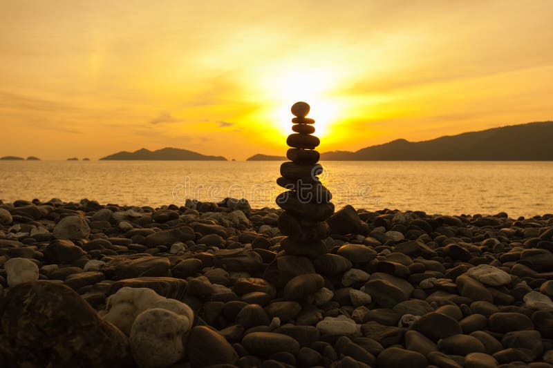 Zen meditation background,Balanced stones stack close up on sea beach. Zen meditation background,Balanced stones stack close up on sea beach