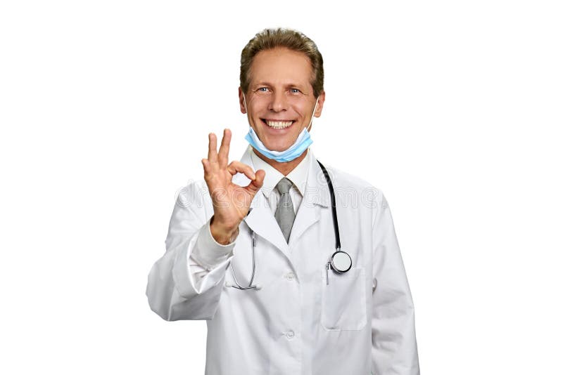Ausgezeichnete Geste der Vertretung des medizinischen Spezialisten lizenzfreie stockfotografie Ausgezeichnete Geste der Vertretung des medizinischen Spezialisten lizenzfreie stockfotografie