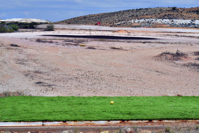 Australia, tee on grass-less golf course in Coober Pedy. Australia, tee on grass-less golf course in Coober Pedy
