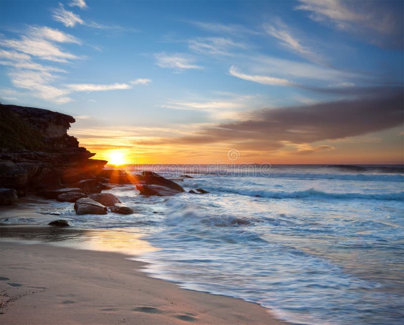 Australian beach at sunrise stock images Australian beach at sunrise stock images