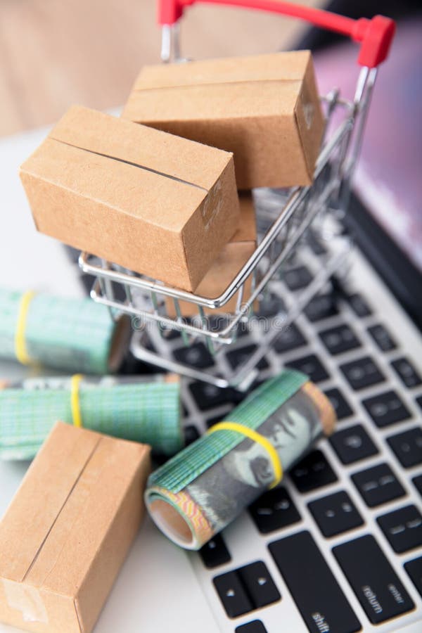 Australian Dollars on the Keyboard and a Shopping Cart with Express