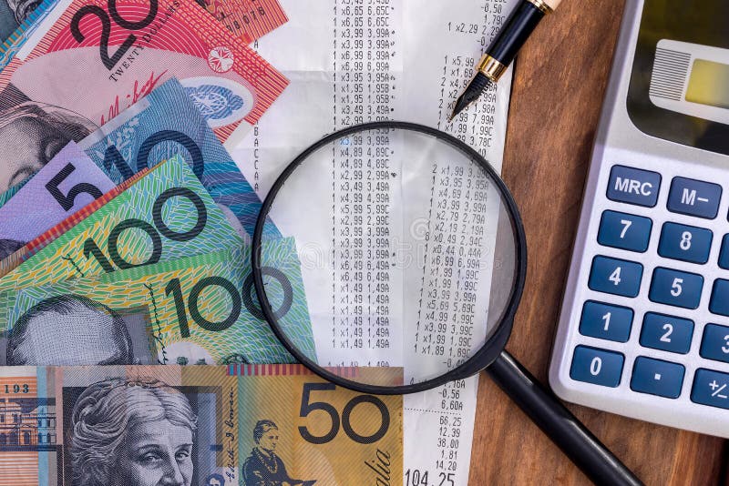 Becks Gooey loft Australian Dollars with Receipt, Calculator, Pen and Magnifier Stock Image  - Image of desk, financial: 153706849