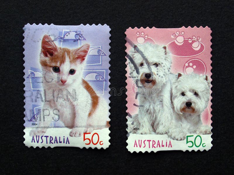 Australiensiska stolpestämplar med djur royaltyfri bild Australiensiska stolpestämplar med djur royaltyfri bild
