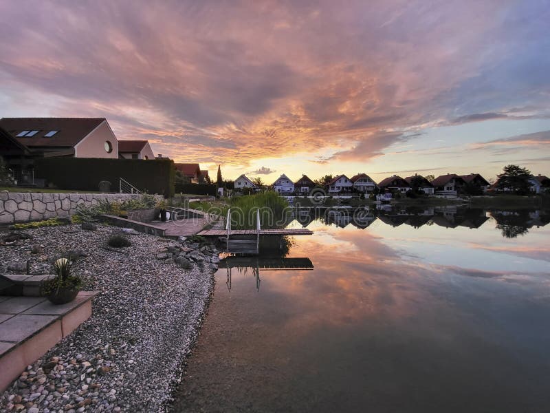 Austria, Sundown over Lake stock photo. Image of homes 265512526