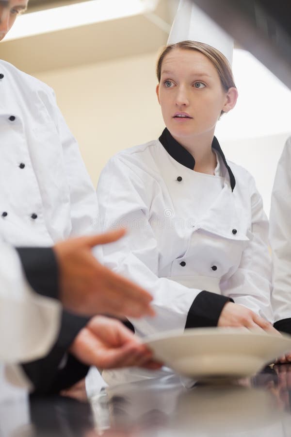 Auszubildendchef, der auf Lehrer hört stockfoto Auszubildendchef, der auf Lehrer hört stockfoto