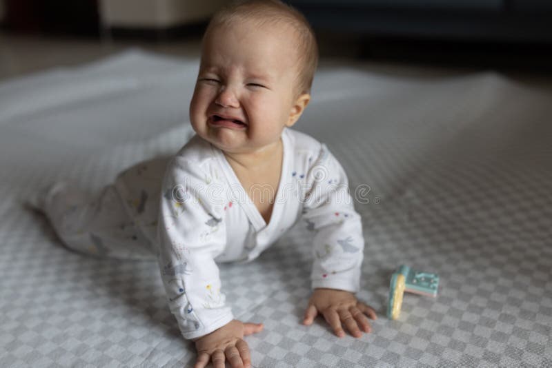 Little Baby Girl Crying on a High Chair Stock Photo - Image of ...