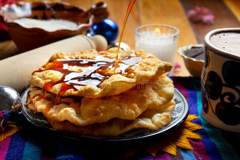 Mexican Buñuelos with Piloncillo Syrup Stock Photo - Image of mexico ...