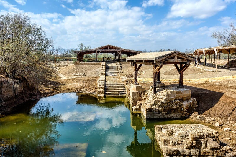 Authentic site of Jesus` baptism under blue skies with fluffy clouds