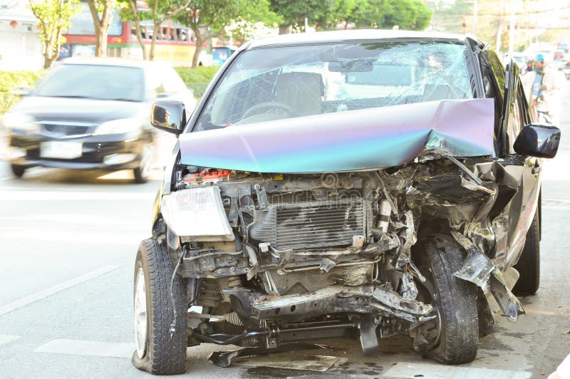 Generic compact car damaged in a rollover accident. Car crash wreck - insurance concept. Generic compact car damaged in a rollover accident. Car crash wreck - insurance concept.