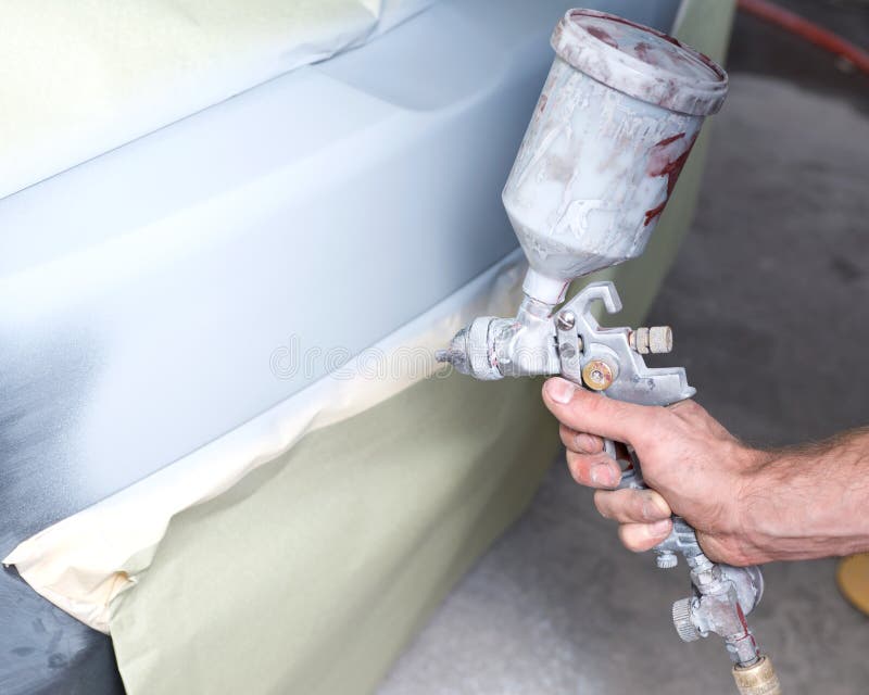Collision Repairs Service. Mechanic Grinding Car Body by Grinder Stock