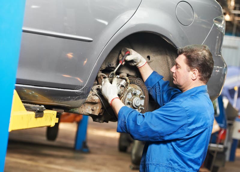 Auto Mechanic at Car Suspension Repair Work Stock Photo Image of