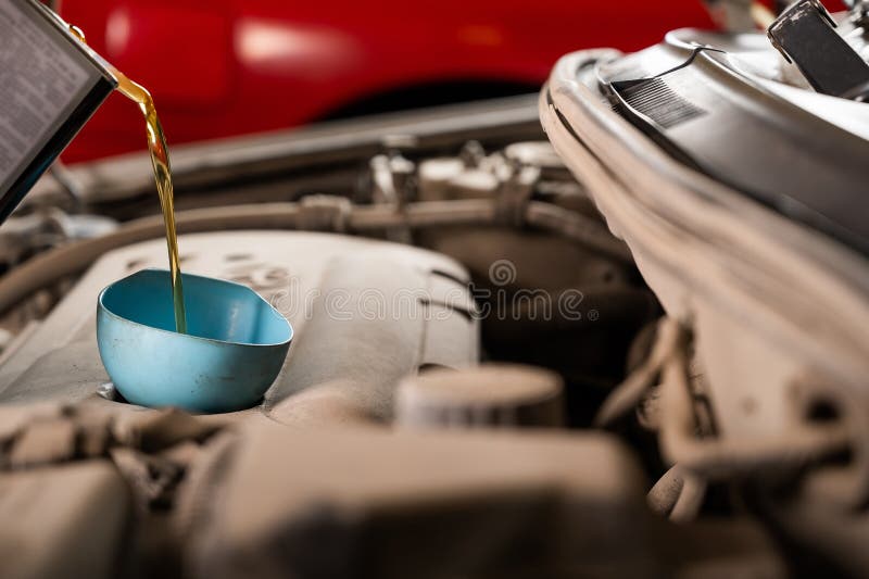 Change of Old Oil in a Car Engine. Stock Photo Image of fuel, auto