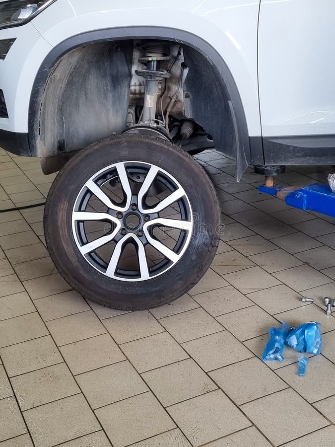 Auto Repair Shop, Tire Fitting, Car Wheel Replacement Stock Image