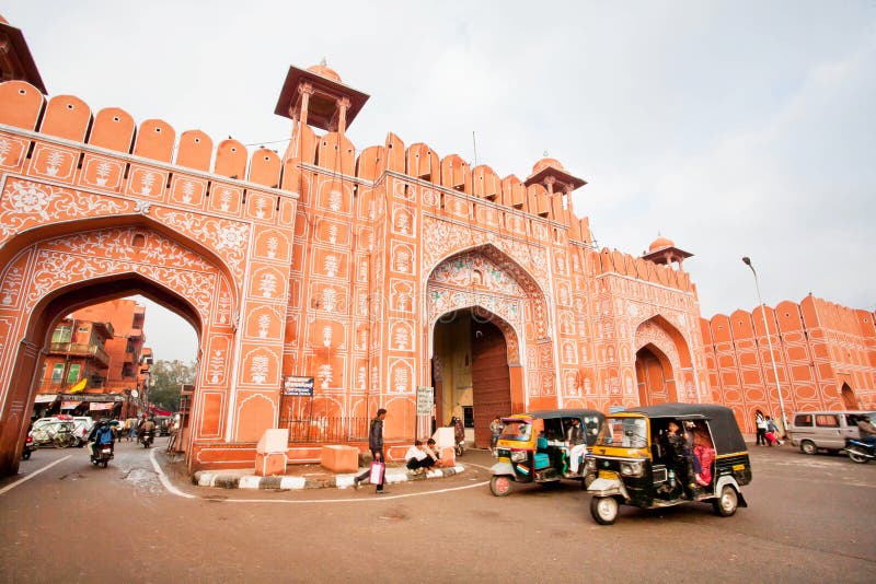 JAIPUR, INDIA: Auto rickshaw drive fast near the old Ajmer gate of historical Pink City wall. Jaipur, with population 6,664,000 people, is a capital of Rajasthan. JAIPUR, INDIA: Auto rickshaw drive fast near the old Ajmer gate of historical Pink City wall. Jaipur, with population 6,664,000 people, is a capital of Rajasthan