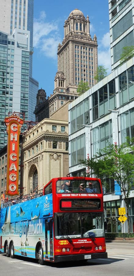 Tour bus and tourists in Chicago. Tour bus and tourists in Chicago.