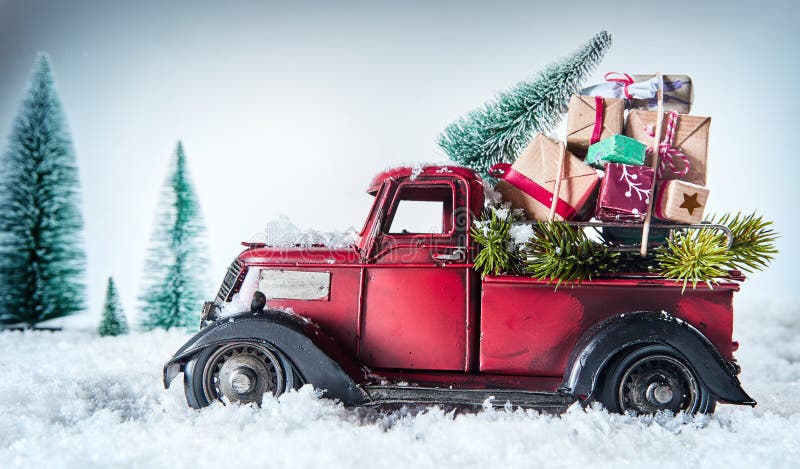 autocarro rosso vintage per consegnare regali di Natale
