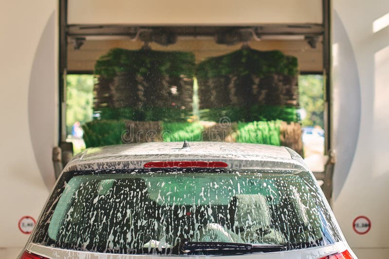 Automatic Car Wash Service in Action on a Sunny Day Stock Image Image