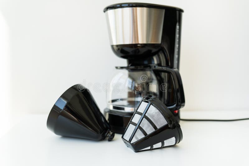 Automatic Drip Coffee Maker Isolated on White Table. Black Modern Drip