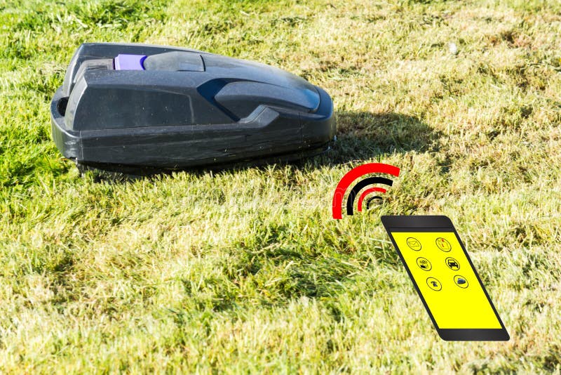 Automatic lawnmower control via smartphone royalty free stock photo Automatic lawnmower control via smartphone royalty free stock photo