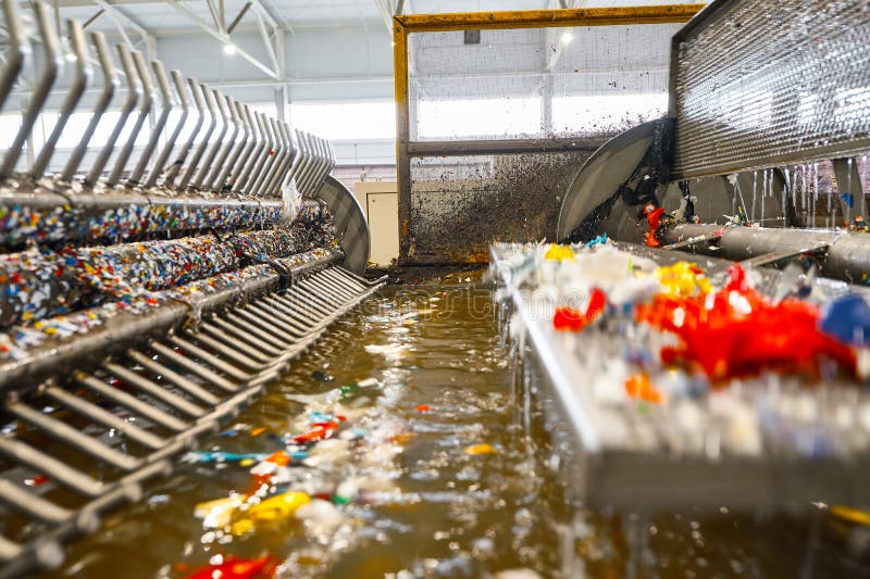 Automatic Machine Tool Cuts and Transports Waste Plastic Stock Image