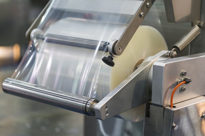 Automatic Packing Machine with Plastic Bag and Paper Box Stock Image