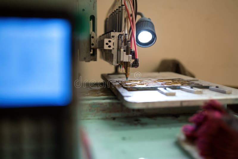 Automatic pattern painting machine royalty free stock photos