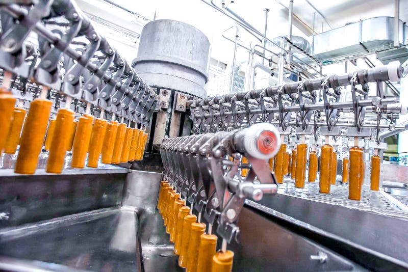 Automatic production line of fruit ice cream stock image