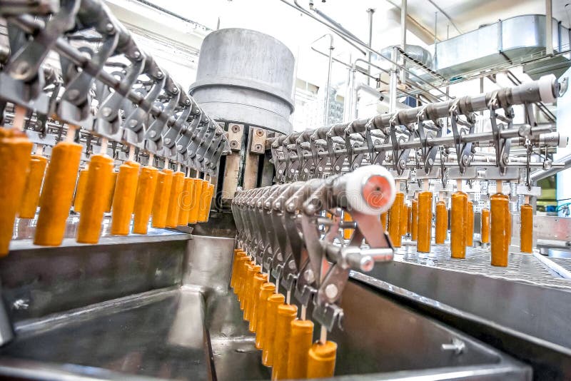 Automatic production line of fruit ice cream stock photo