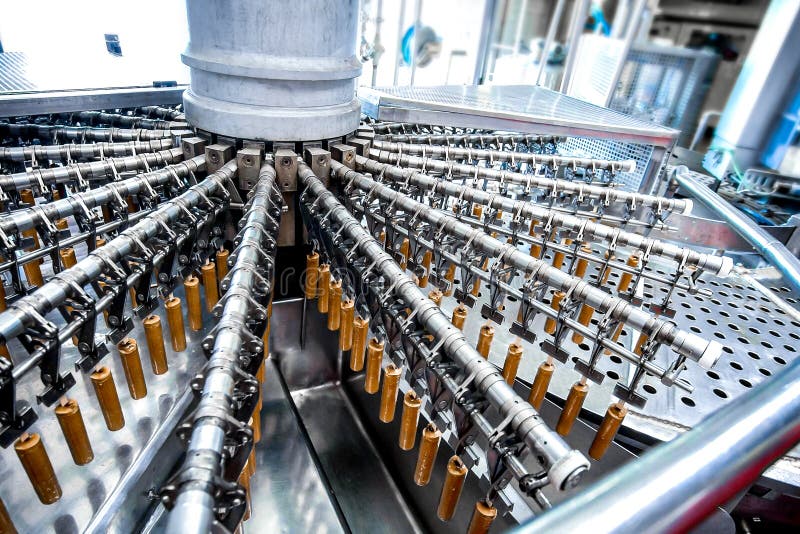 Automatic production line of fruit ice cream stock photography