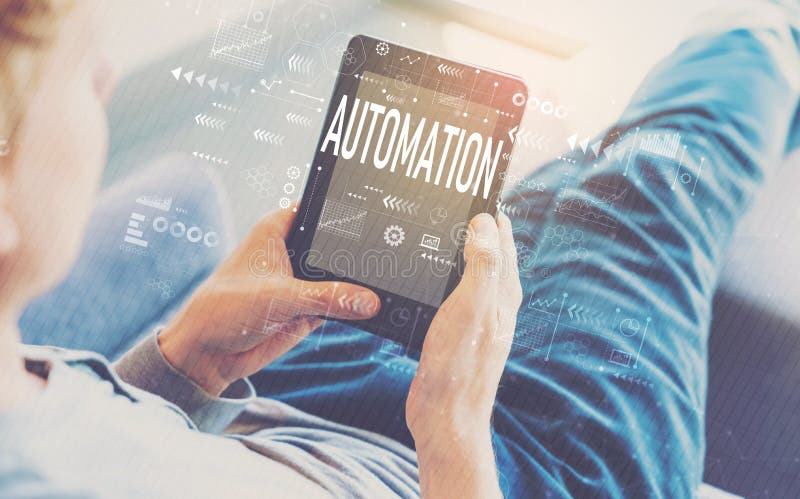 Automation with man using a tablet royalty free stock image Automation with man using a tablet royalty free stock image