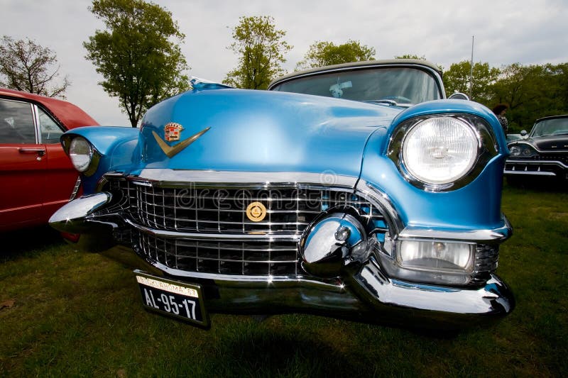 ROSMALEN, THE NETHERLANDS - MAY 16: 1955 Cadillac Eldorado Special Convertible classic car on the Rock Around the Jukebox Open Air event on May 16, 2010 in Autotron Rosmalen. ROSMALEN, THE NETHERLANDS - MAY 16: 1955 Cadillac Eldorado Special Convertible classic car on the Rock Around the Jukebox Open Air event on May 16, 2010 in Autotron Rosmalen.