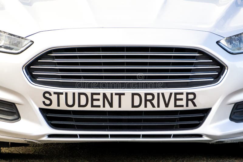 Automobile with student driver lettering on front grille. Automobile with student driver lettering on front grille.