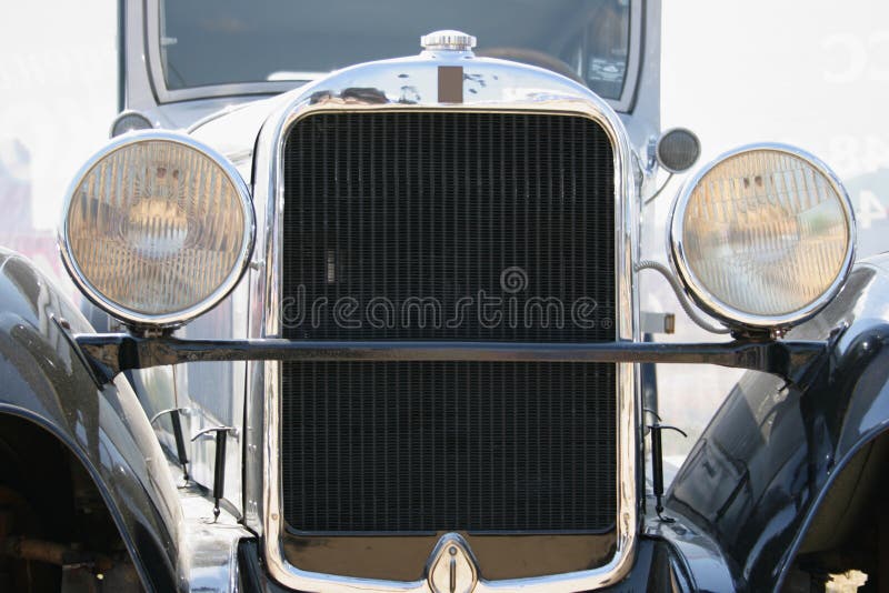 Vintage car from the front close up. Vintage car from the front close up