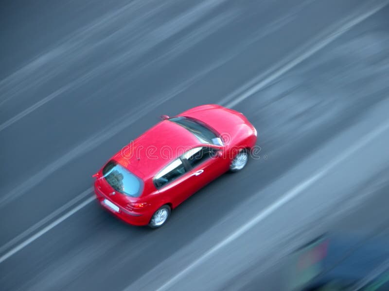 Automobile di accelerazione veloce fotografie stock libere da diritti Automobile di accelerazione veloce fotografie stock libere da diritti