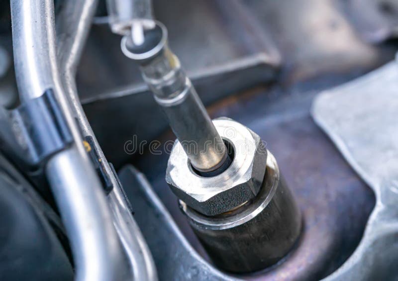 Automotive sensor lambda probe in a diesel engine. Measuring oxygen content in car exhaust gases, macro stock photography
