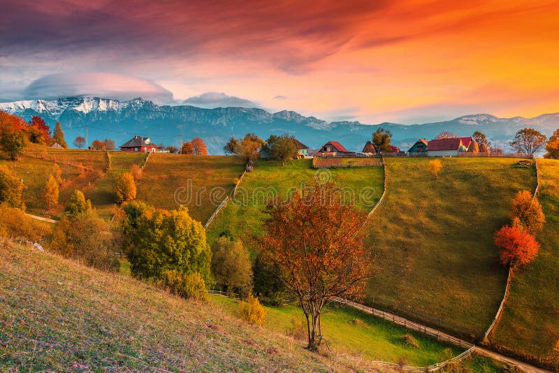 Autumn alpine rural landscape near Brasov, Magura village, Transylvania, Romania. Beautiful autumn alpine landscape, famous alpine village with stunning colorful stock photo Autumn alpine rural landscape near Brasov, Magura village, Transylvania, Romania. Beautiful autumn alpine landscape, famous alpine village with stunning colorful stock photo