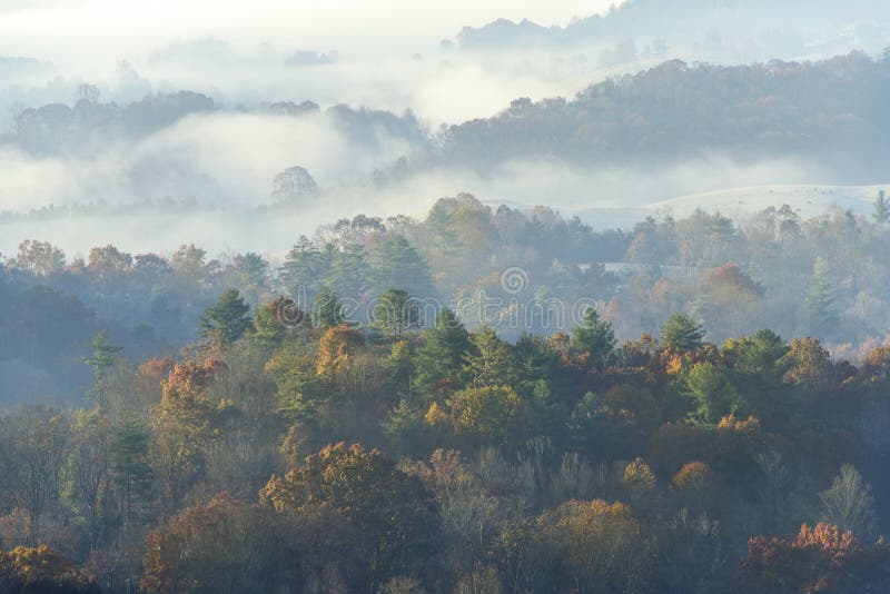 Autumn Colors and a Fog Mist over the Valley