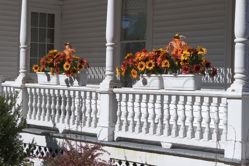 Autumn Flowers on Railing