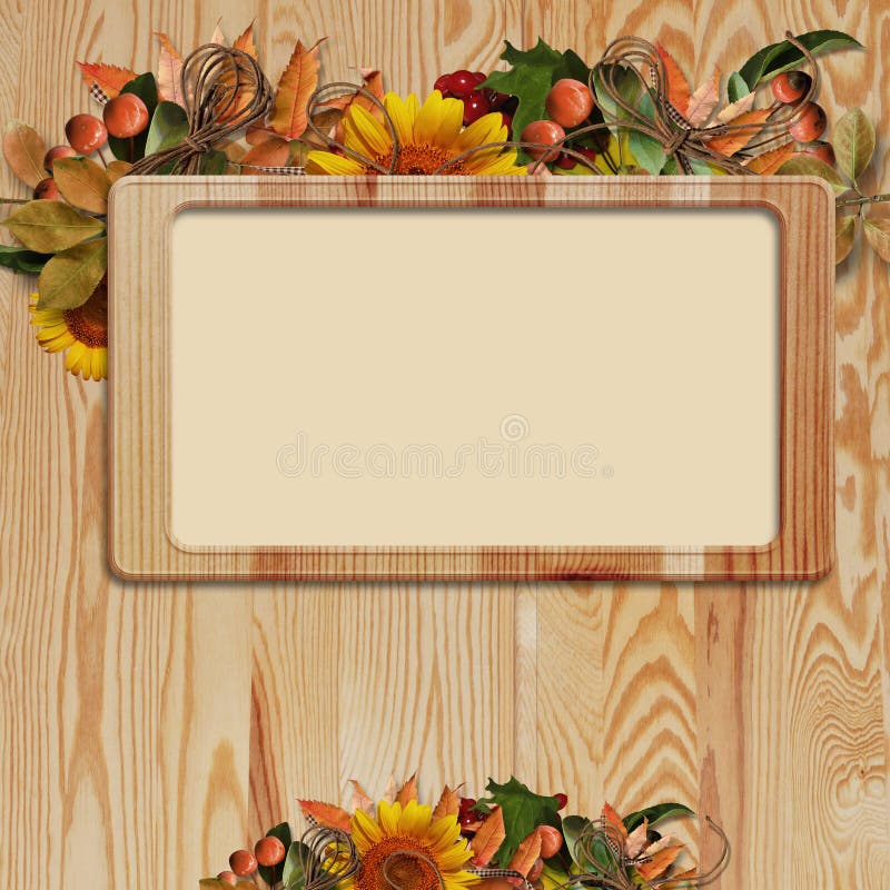 autumn frame on wooden background