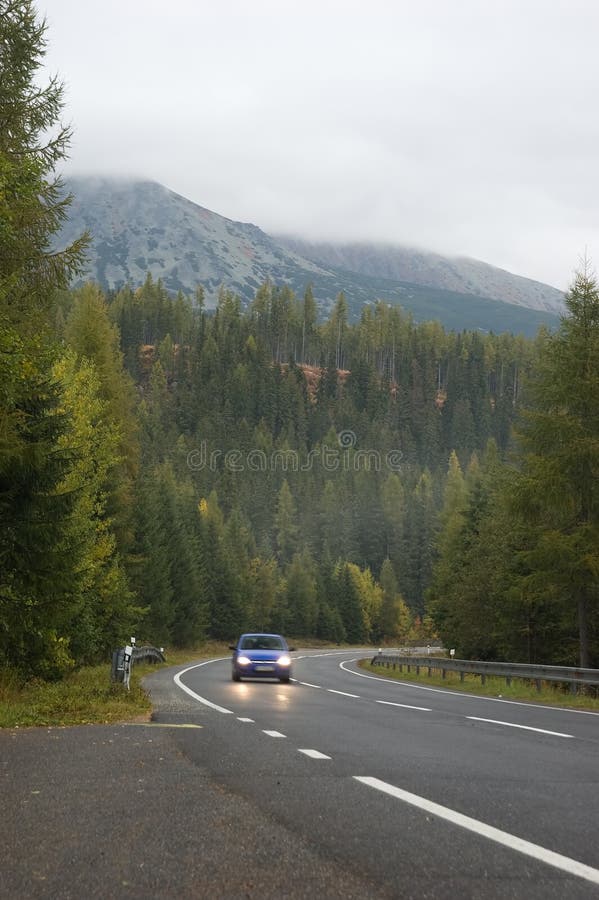 Autumn land road in mountains