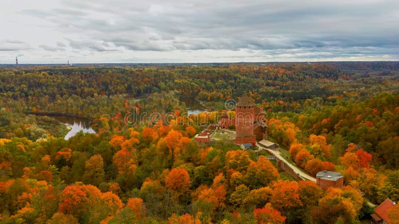 Autumn Landscape View of the Old Turaida Castle , Build From Red Bricks.