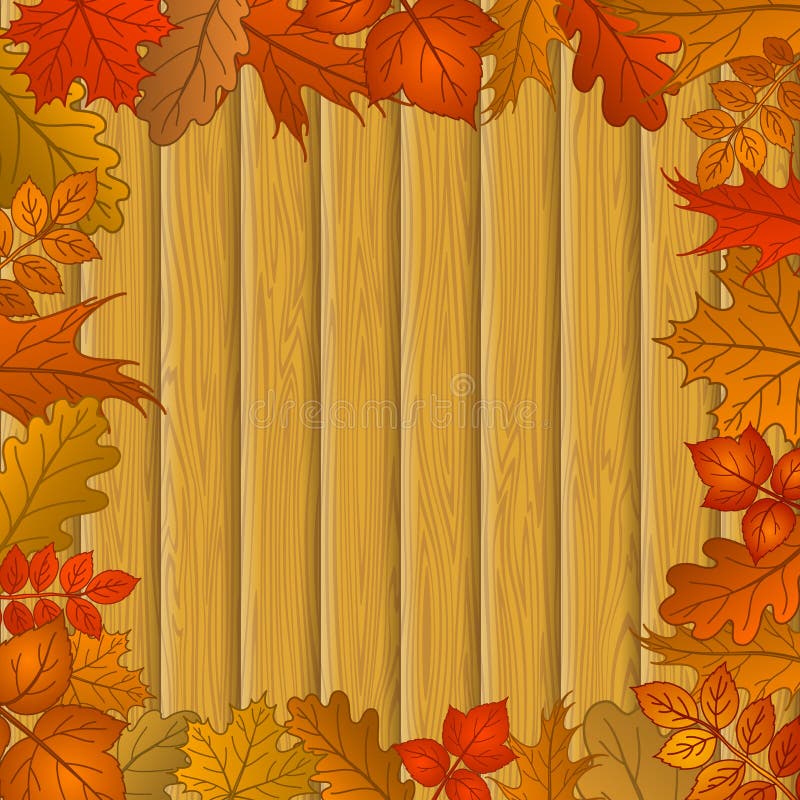 Autumn leaves and wooden fence