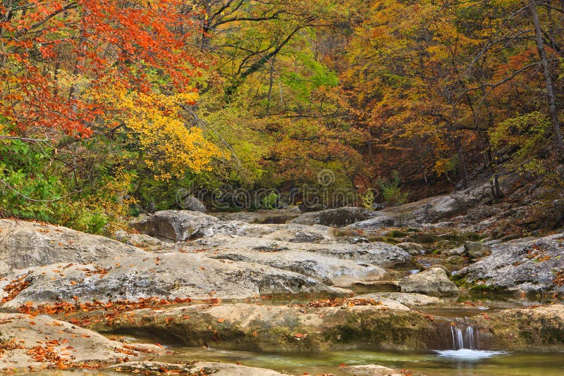 Autumn mountain cascade